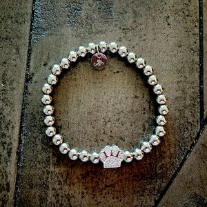 NWOT Nogu Silver bracelet with paw print charm.